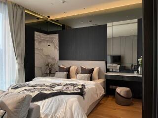 Elegant modern bedroom with integrated workspace