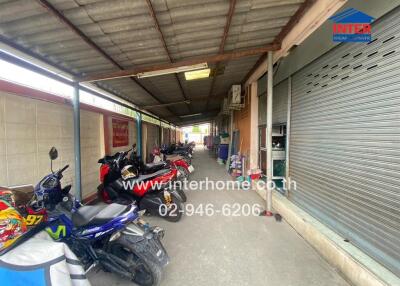 Motorbike parking garage with metal roof
