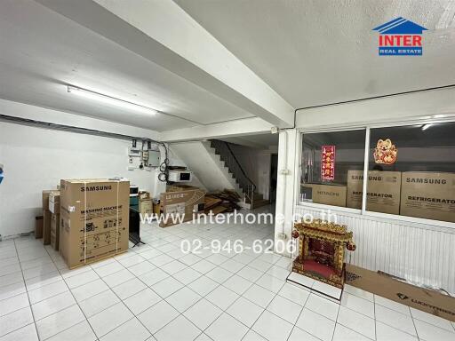 Spacious garage with storage capacity and multiple boxes