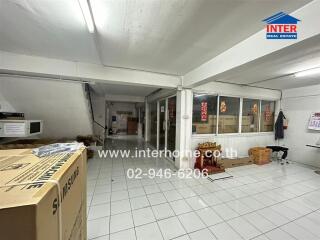 View of a spacious commercial space with storage areas