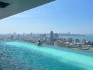 Luxurious rooftop infinity pool overlooking the city skyline and ocean