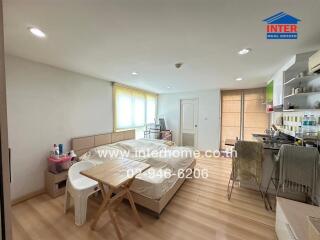 Bright and well-furnished studio apartment with integrated living and kitchen space
