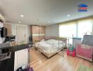 Spacious and Well-lit Bedroom with Ample Storage
