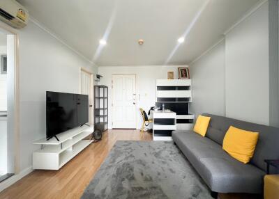 Spacious and modern living room with abundant natural light