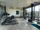 Spacious residential gym with modern equipment and city views