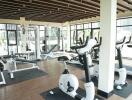 Modern gym with various exercise equipment in a residential building