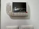Security intercom system on a wall