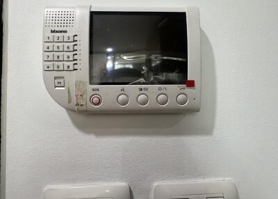 Security intercom system on a wall