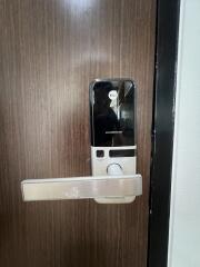 modern security smart lock on wooden door