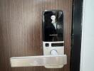 modern security smart lock on wooden door