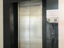 Modern elevator entrance in a building lobby