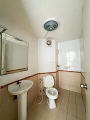 Clean and simple bathroom interior with white fixtures