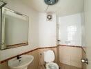 Clean and simple bathroom interior with white fixtures