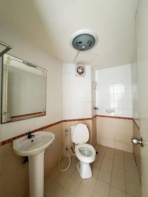 Clean and simple bathroom interior with white fixtures