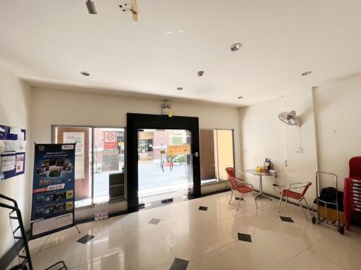 Spacious lobby area with modern furnishings and ample natural light