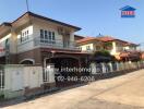 Spacious two-story house with balcony and carport