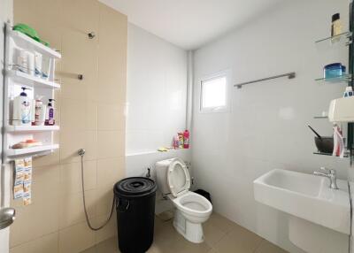 Spacious modern bathroom with essential amenities