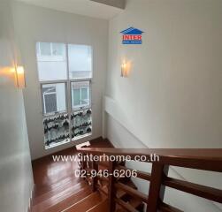 Bright staircase area with natural lighting