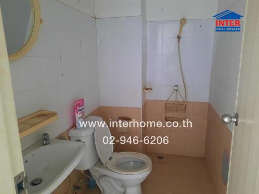 Compact bathroom with basic amenities