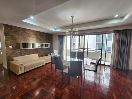 Spacious living room with modern furniture and natural light