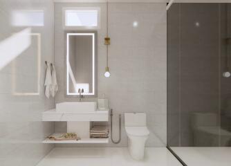 Modern spacious bathroom with white fixtures and elegant lighting