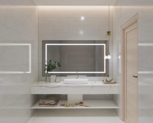Modern bathroom with large mirror and bright lighting