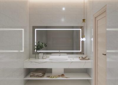 Modern bathroom with large mirror and bright lighting