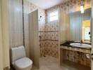 Modern bathroom interior with tiled walls and floors
