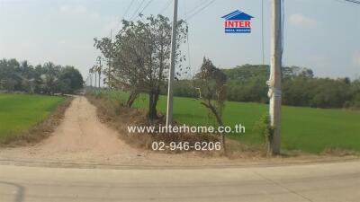 Rural landscape with potential real estate development land along a dirt road