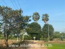 Rural outdoor landscape with real estate signage