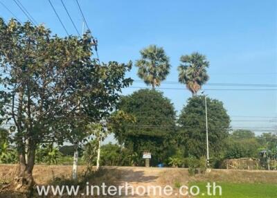 Rural outdoor landscape with real estate signage