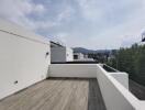 Modern residential building terrace with scenic mountain view