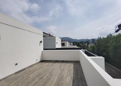 Modern residential building terrace with scenic mountain view