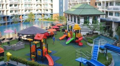 Colorful playground and swimming pool in a residential complex courtyard
