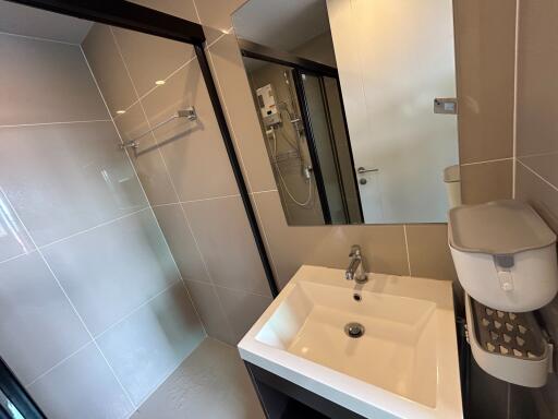 Modern Bathroom with White Fixtures and Glass Shower