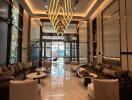 Luxurious hotel lobby with modern chandelier and elegant furnishings