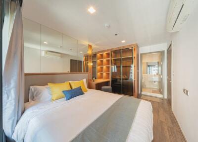 Spacious bedroom with modern design and attached bathroom