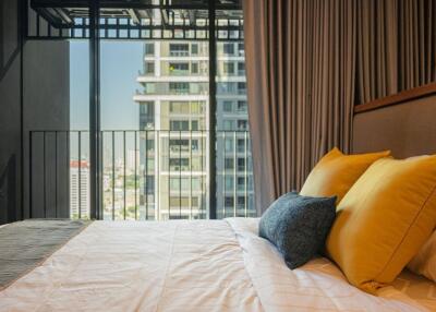 Modern bedroom with urban view