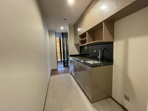 Modern kitchen with sleek cabinetry and integrated appliances