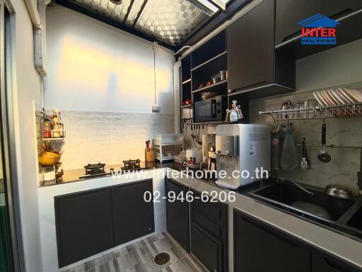 Modern kitchen with stainless steel appliances and ample cabinet space