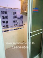 Small balcony with open view and air conditioning unit