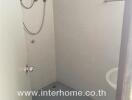Compact bathroom with shower and white tiles