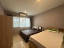 Spacious and well-furnished bedroom with modern amenities