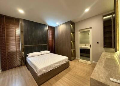 Elegant bedroom interior with attached bathroom