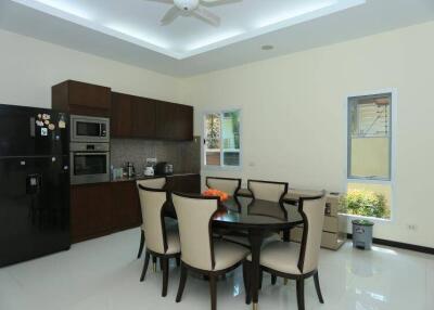 Modern kitchen with dining area and view of the garden