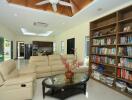 Spacious living room with modern furniture and built-in bookshelves