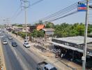 Busy urban street with mixed residential and commercial buildings