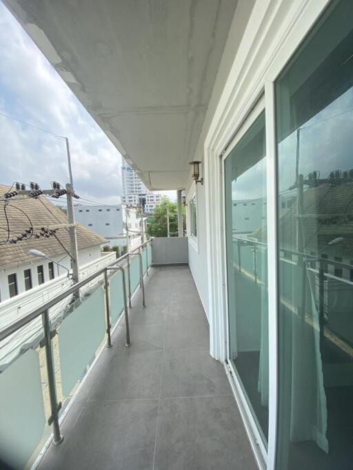Spacious balcony with a scenic view and safety railings