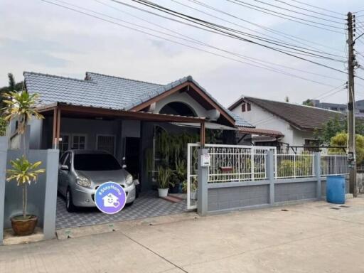 Modern residential house with carport and car parked