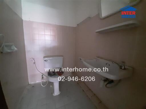 Compact bathroom with basic amenities